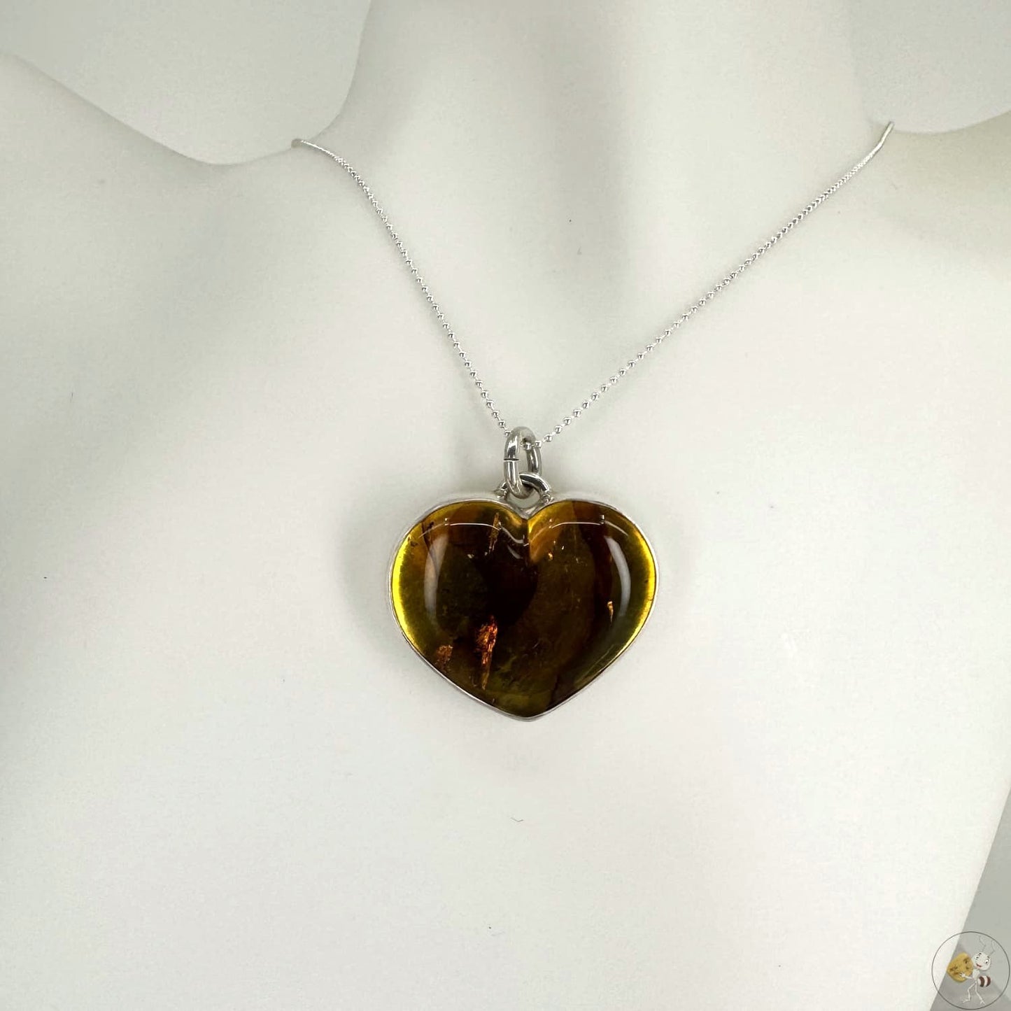 Pendentif en forme de cœur en ambre naturel monté sur argent 925/950-01