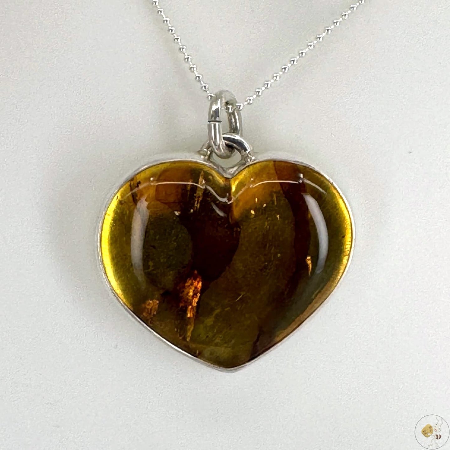 Pendentif en forme de cœur en ambre naturel monté sur argent 925/950-02