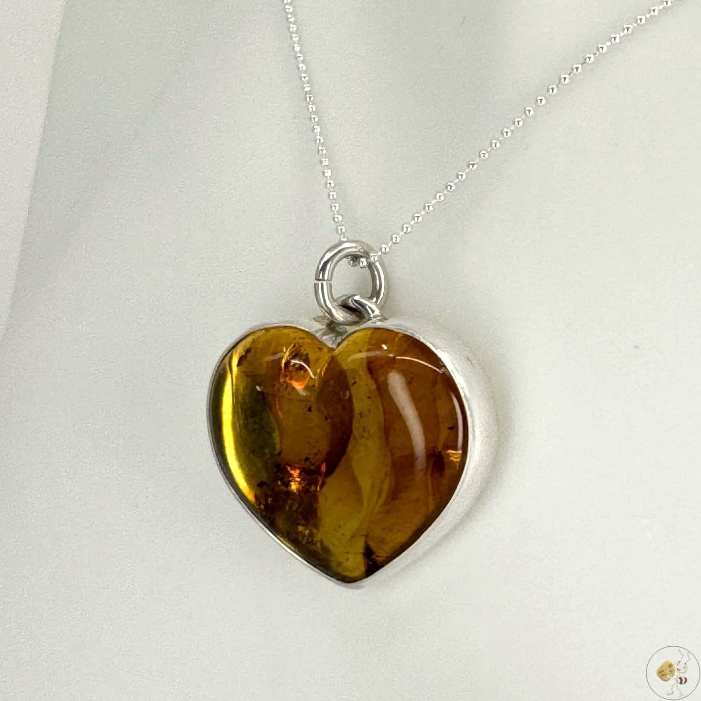 Pendentif en forme de cœur en ambre naturel monté sur argent 925/950-03