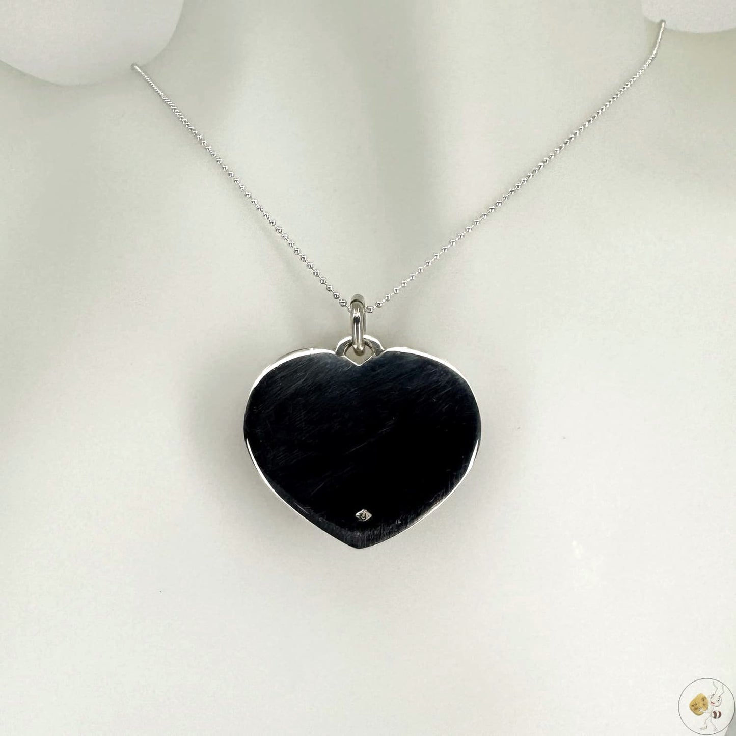 Pendentif en forme de cœur en ambre naturel monté sur argent 925/950-04
