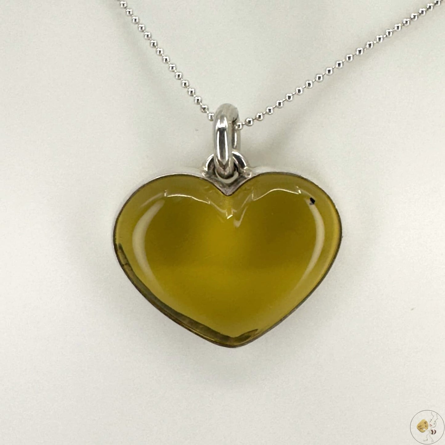 Pendentif en ambre naturelle en forme de cœur, monté sur argent 925/950 – bijou artisanal Formiga Loca-02