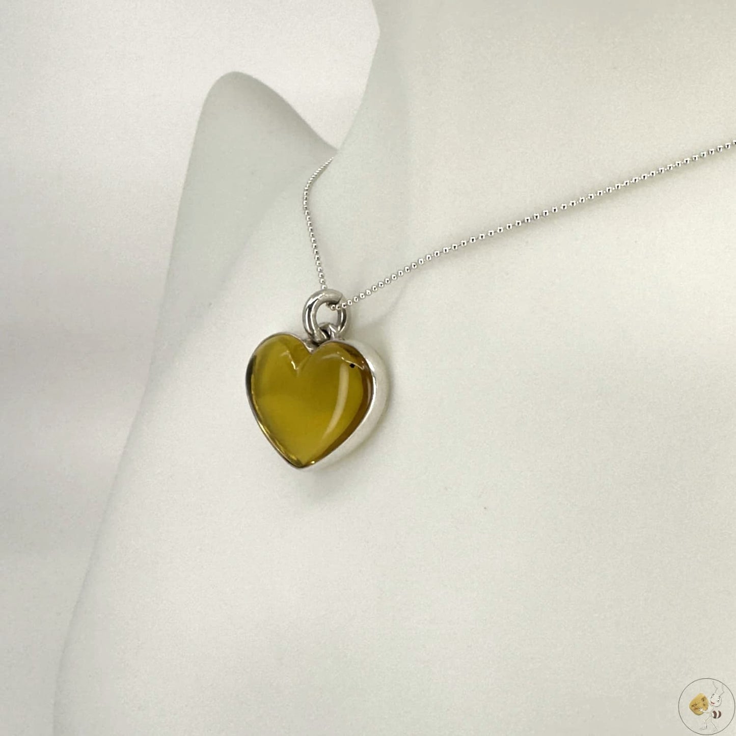 Pendentif en ambre naturelle en forme de cœur, monté sur argent 925/950 – bijou artisanal Formiga Loca-03