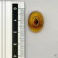 Cabochon en ambre jaune du Mexique, forme ovale, avec des inclusions naturelles et une finition polie. Présenté avec une règle pour référence