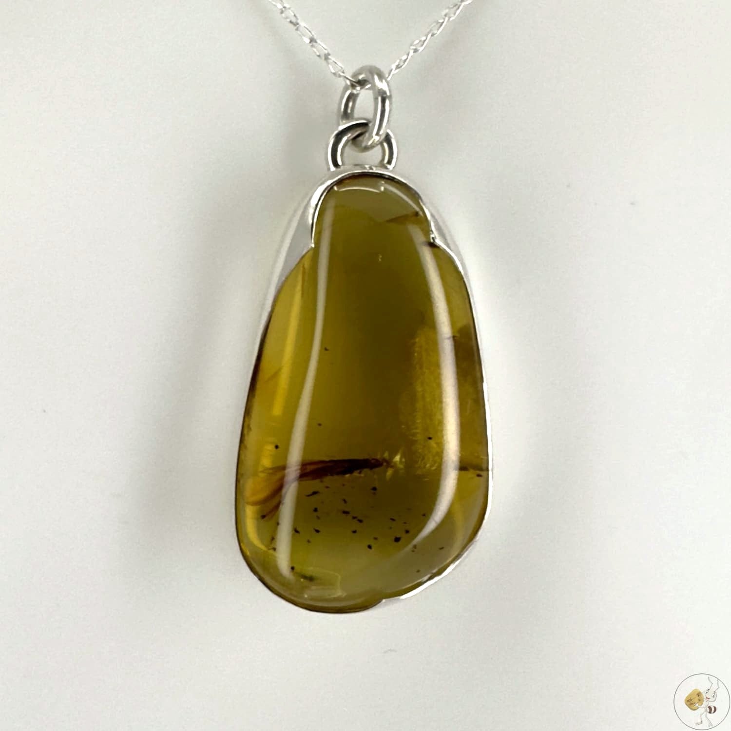 Pendentif en ambre naturel avec inclusion, monté en argent 925/950-02