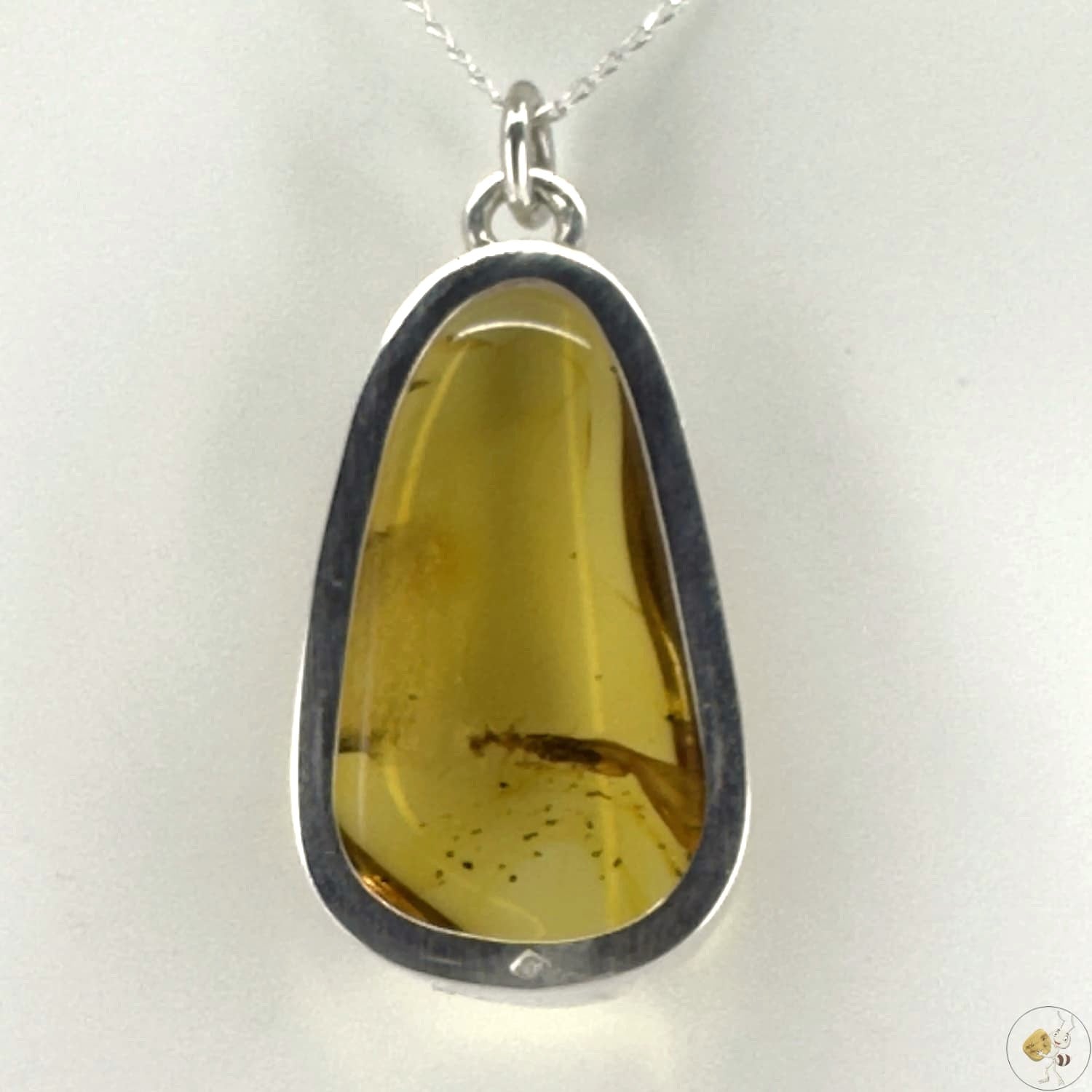Pendentif en ambre naturel avec inclusion, monté en argent 925/950-04