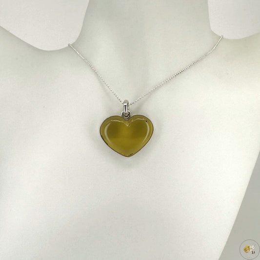 Pendentif en ambre naturelle en forme de cœur, monté sur argent 925/950 – bijou artisanal Formiga Loca-01