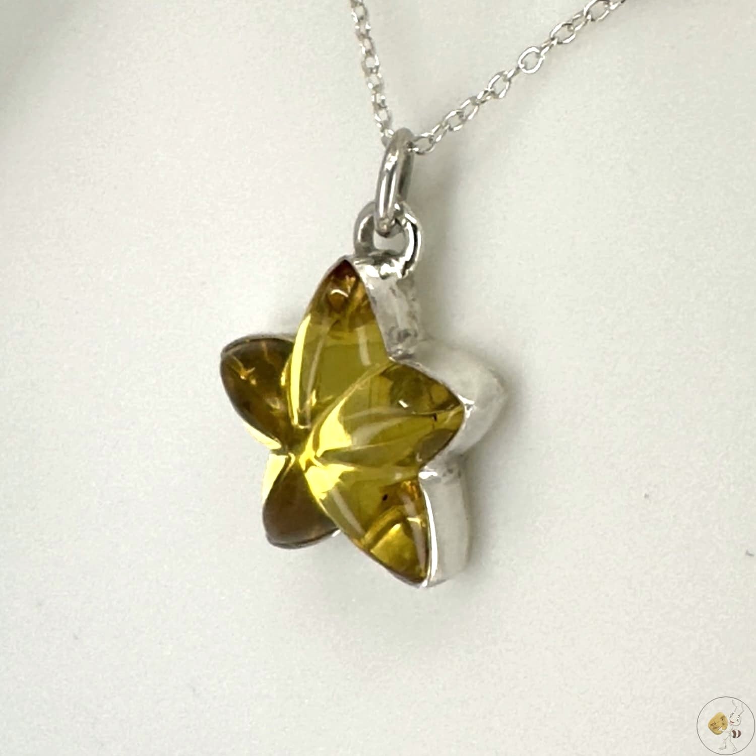 Pendentif étoile en ambre naturel monté sur argent 925/950-03
