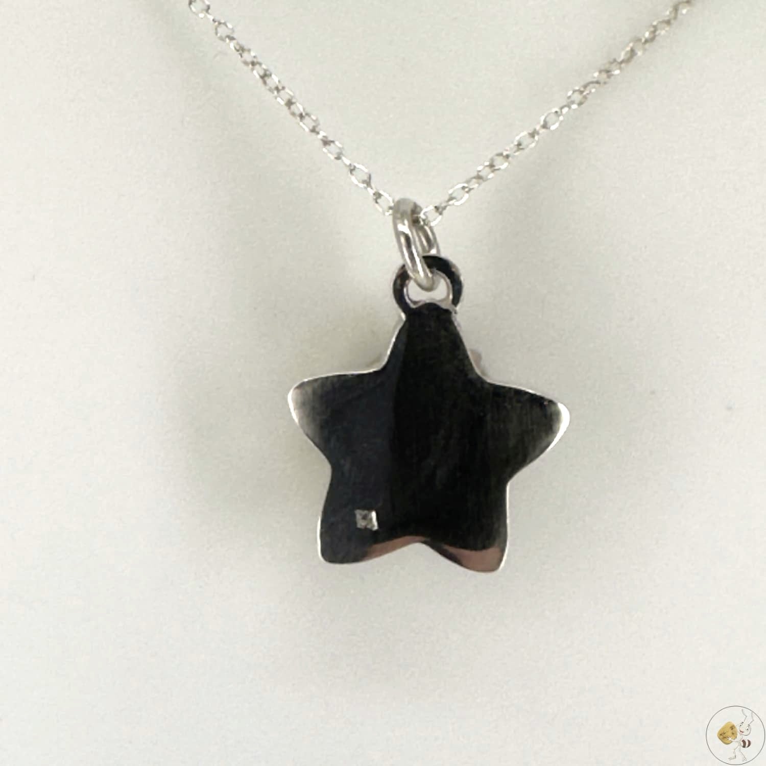 Pendentif étoile en ambre naturel monté sur argent 925/950-04