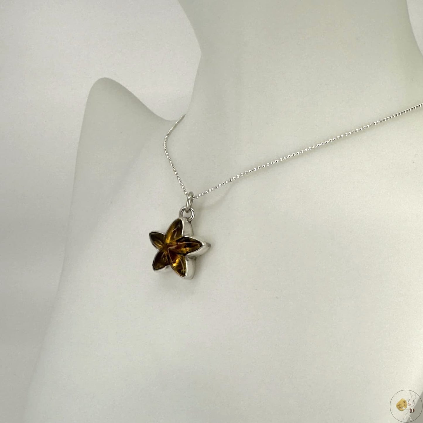 Pendentif étoile en ambre naturel monté sur argent 925/950-03